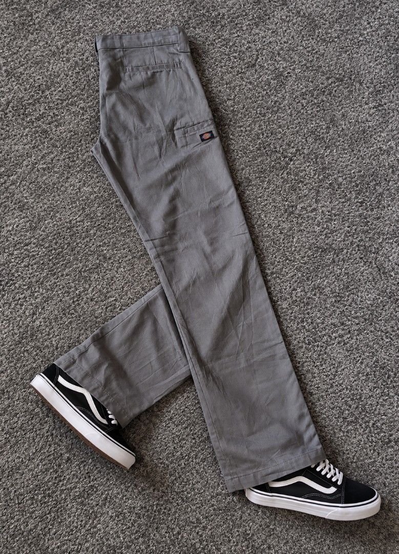 Dickies Grey Work Pants (Category: Trousers) located in Manila. Submitted by livedolphin_68dee2 (Listing ID 1464774169, Image 1). Description: - Authentic Dickies work pants - Versatile grey colorway - Straight leg fit that pairs well with sneakers - Features a small Dickies logo patch near the pocket - Equipped with standard belt loops and back pockets - Clean, everyday trousers that are easy to style.