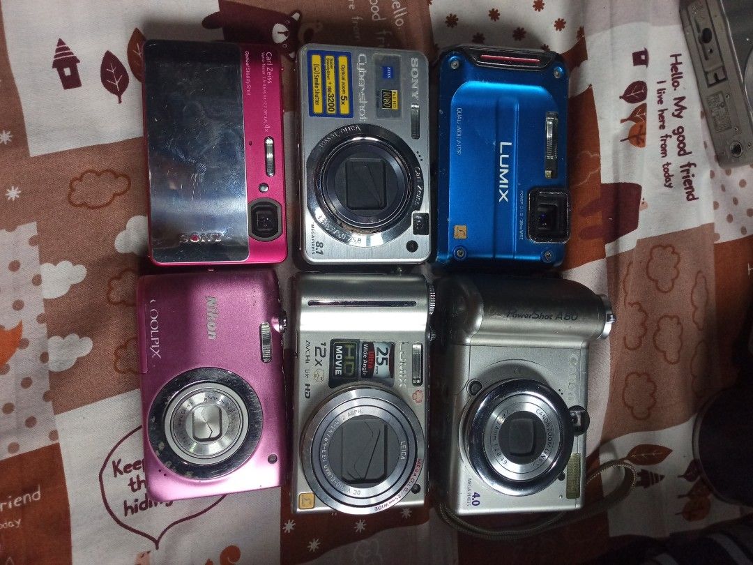 Digital Cameras Bundle (Category: Cameras) located in Minglanilla. Submitted by keith_digicams (Listing ID 1464813685, Image 1). Description: WORKING AND FOR PARTS DIGITAL CAMERAS price range 500-1500 Canon A80 - Working Lumix silver - Working Sony tx1 - For parts sony silver - Working Lumix blue - Working Nikon - Lens error for meet ups anywhere sa cebu or jnt/maxim .