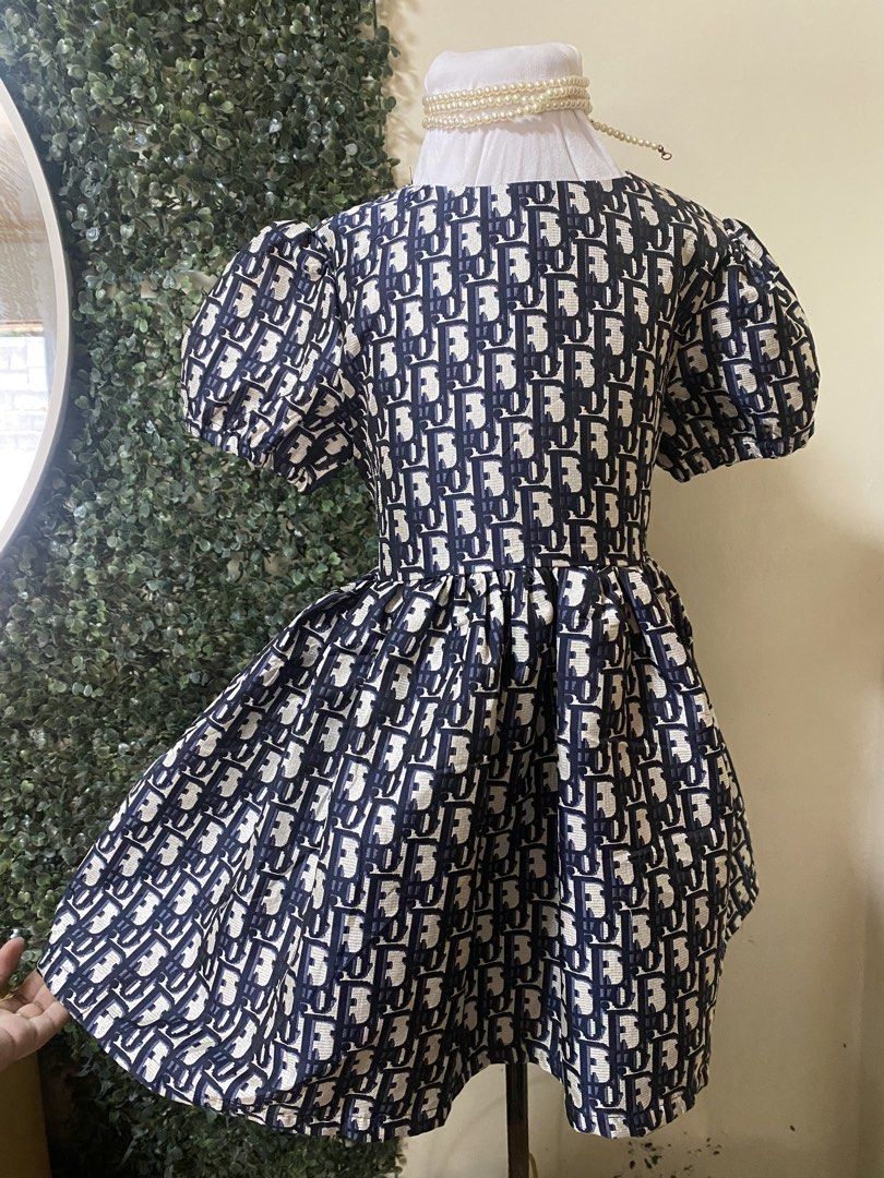 Dior embossed monogram dress for kids (Category: Babies & Kids Fashion) located in Manila. Submitted by avathriftedcloset (Listing ID 1464856571, Image 1). Description: .