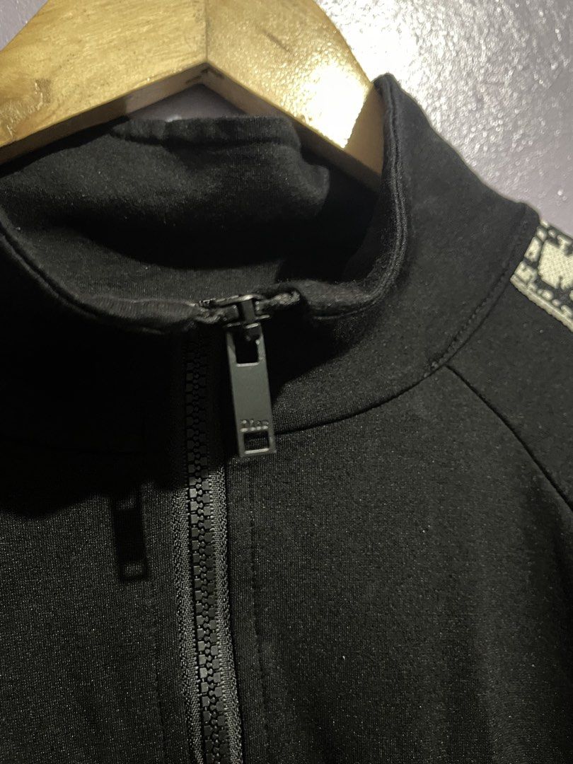 Dior Oblique Side Tape Zip-up Jacket (Category: Tshirts & Polo Shirts ) located in Angeles City. Submitted by andreiboughts (Listing ID 1464920897, Image 3). Description: Length: 26.5 Width: 20.5 Condition: 9/10 Color rate: 9/10 Issue (s): medyo na-detach yung tape design sa left sleeve pero intact pa rin Complete Tags ✅ Small on tag.
