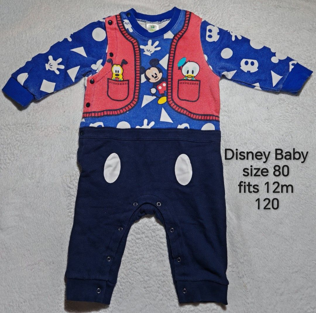 Disney Baby Mickey Mouse Romper Size 80 12M (Category: Babies & Kids Fashion) located in Quezon City. Submitted by maypamor (Listing ID 1464864433, Image 1). Description: - Authentic Disney Baby romper featuring Mickey, Donald, and Pluto graphics - Size: 80 (fits 12 months) - Design: Blue top with geometric prints and faux vest, paired with dark blue bottoms featuring white button accents - Convenience: Snap buttons along the legs and inner thigh