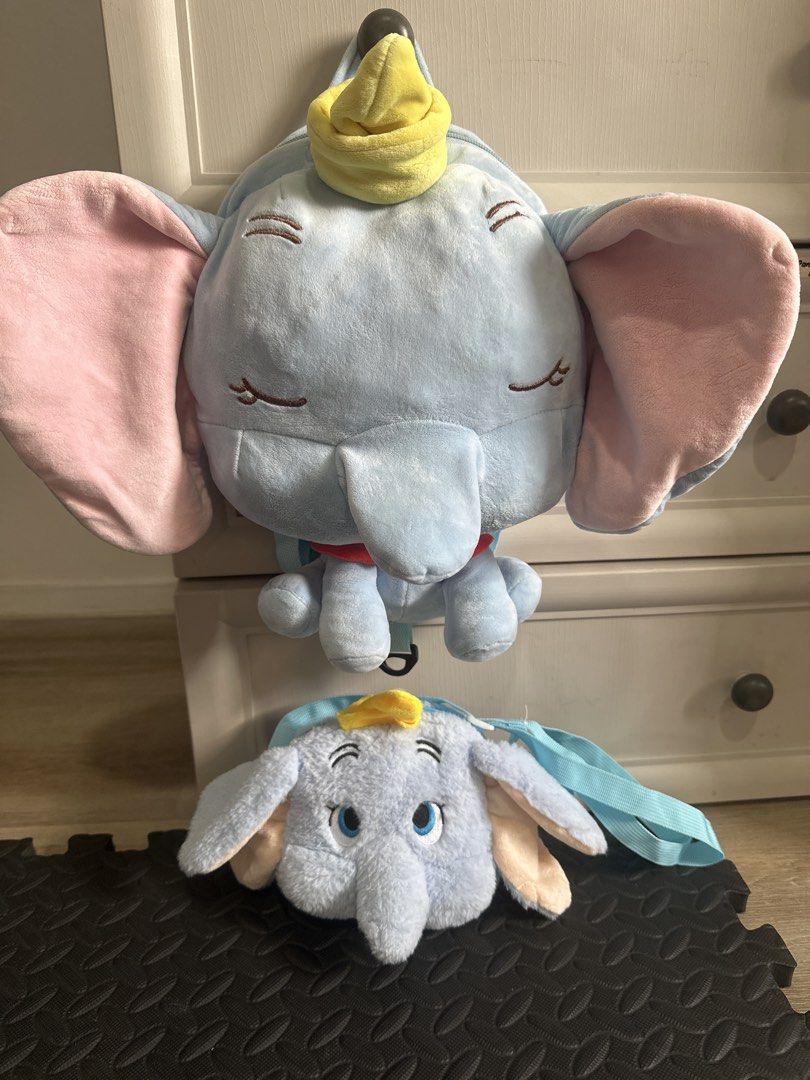 Disney Dumbo plush backpack and mini bag set (Category: Plushies & Soft Toys) located in Cainta. Submitted by shopbyyna (Listing ID 1464794252, Image 1). Description: - Disney Dumbo bag set (includes 2 pieces: 1 plush backpack and 1 mini sling bag) - Larger backpack features adjustable straps, secure zipper compartment, and white interior lining - Smaller mini sling bag comes with a matching light blue strap - Made of soft, cozy fuzzy material in