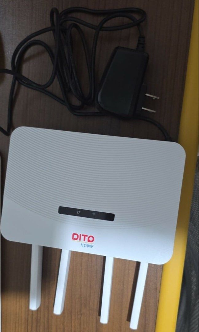 DITO Wowfi Lite (NO COD) (Category: Networking) located in Liloan. Submitted by _lkdp (Listing ID 1464791062, Image 1). Description: - Brand: DITO Wowfi Lite - Color: White - Condition: Tested, status lights fully working - Features: 4 external antennas for strong signal, compact design - Inclusions: Router, black power adapter, power cord, box and sim - Perfect use: Great as a reliable backup internet setup for your home - RFS: upgrade - NO COD 