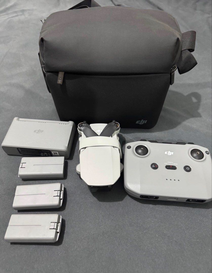DJI Mini Fly More Combo with Controller and Bag (Category: Drones) located in Cavite. Submitted by marcuz1316 (Listing ID 1464959029, Image 2). Description: - Complete DJI drone kit, fully functional and ready to fly - Includes remote controller and charging hub - Comes with 3 batteries for extended flight time - Includes compact carrying bag for easy travel - Foldable design fits easily into the shoulder bag.