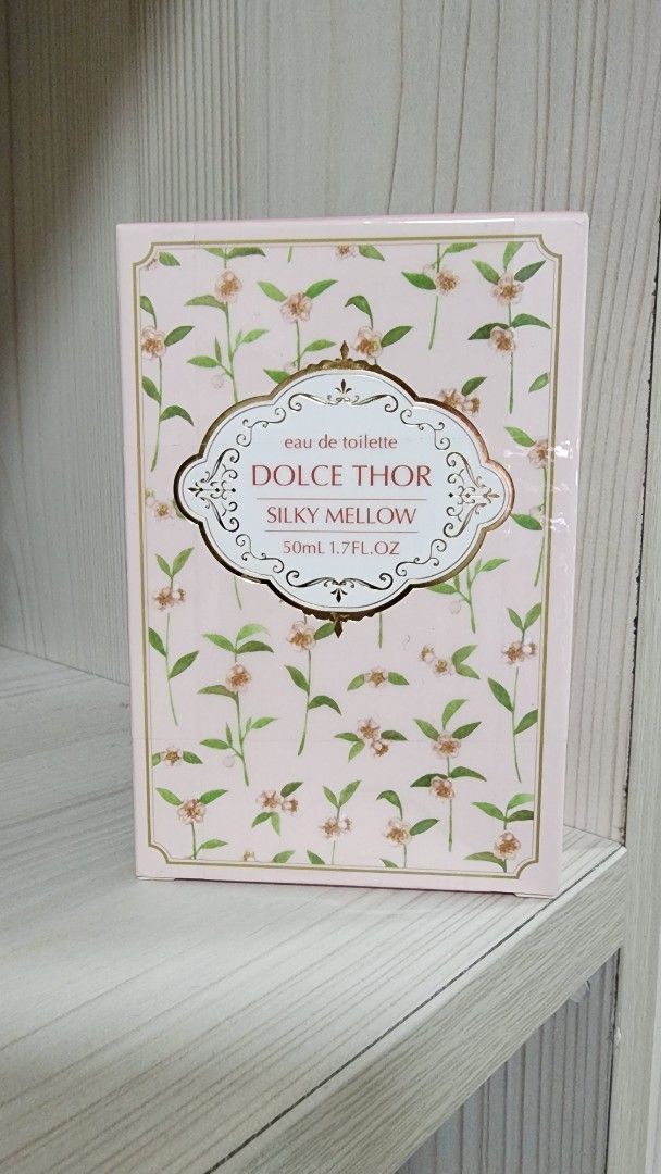 Dolce Thor Silky Mellow Eau de Toilette 50ml (Category: Fragrance & Deodorants) located in Pasig City. Submitted by authentic_rack (Listing ID 1464771491, Image 1). Description: - Brand: Dolce Thor - Product: Silky Mellow Eau de Toilette - Size: 50ml - Condition: Brand new, unopened, and 100% intact box - Source: Bought directly from Don Quijote - Packaging: Gorgeous pink box with floral branch illustrations - Ingredients: Denatured alcohol, wate