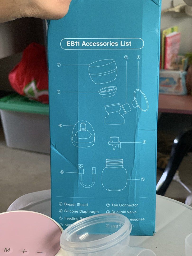Dr. Isla EB11 Electric Breast Pump (Category: Breastfeeding & Bottle Feeding) located in Naga. Submitted by ashleydelpuerto_0 (Listing ID 1464809372, Image 3). Description: - Brand: Dr. Isla EB11 Electric Breast Pump - Color: White & Pink (Single Pack) - Settings: 9-speed adjustment for comfortable expression - Materials: 100% BPA-Free (ABS, PP, and silicone) - Inclusions: Main pump unit, breast shield, tee connector, silicone diaphragm, and duck