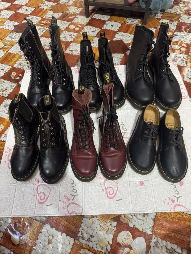 Dr. Martens Boots 100%Original (Category: Boots) located in Manila. Submitted by wildbear.e10374 (Listing ID 1464834041, Image 1). Description: - Authentic Dr. Martens footwear collection - Available styles: tall side-zip boots, classic lace-up boots, oxblood lace-up boots, and low-top shoes - Colors: Classic black and rich oxblood leather - Multiple sizes available - Features iconic yellow welt stitching - Air-cushioned rubber outsoles resistant