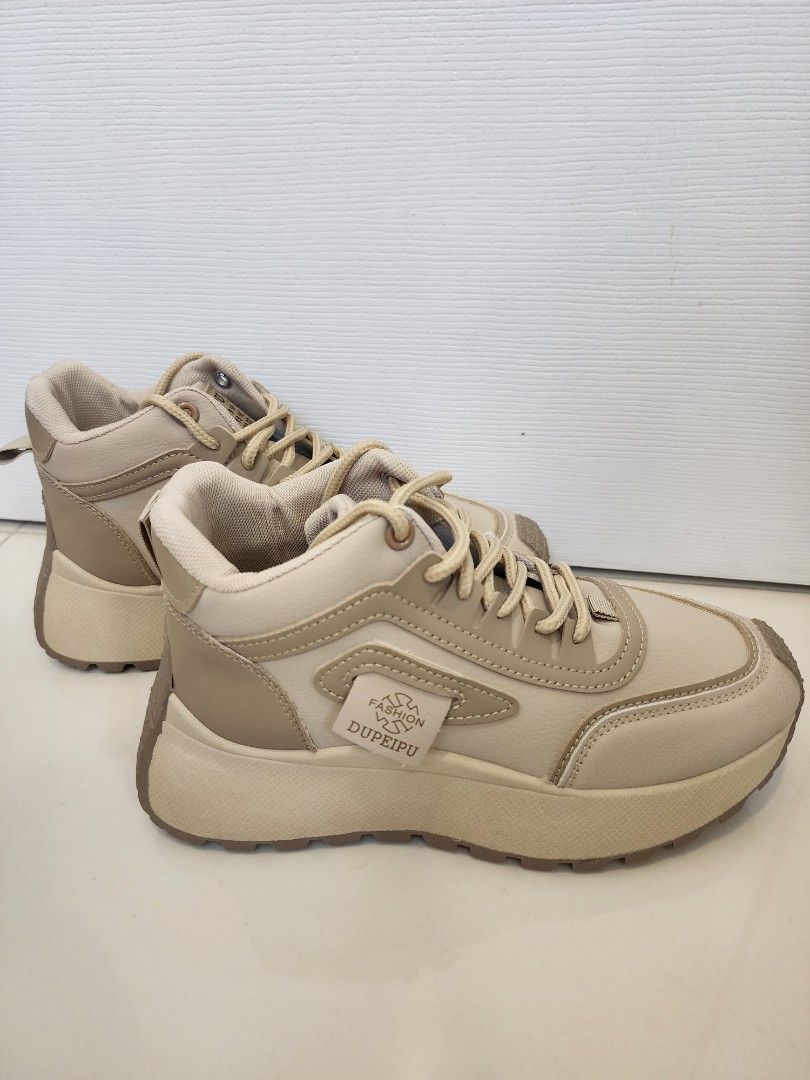 Dupeipu Chunky Platform Sneakers Size 37 (Category: Sneakers) located in Quezon City. Submitted by pinkyshang (Listing ID 1464881584, Image 2). Description: - Brand/Model: Dupeipu Chunky Platform Sneakers - Color: Neutral Beige - Size: 37 (Marked on Outsole) - Design: Lace-up closure with branded tongue label and side tag - Sole: Chunky, textured rubber lug sole - Condition: Clean upper and tread showing minimal to no wear - Brandew. Never been u
