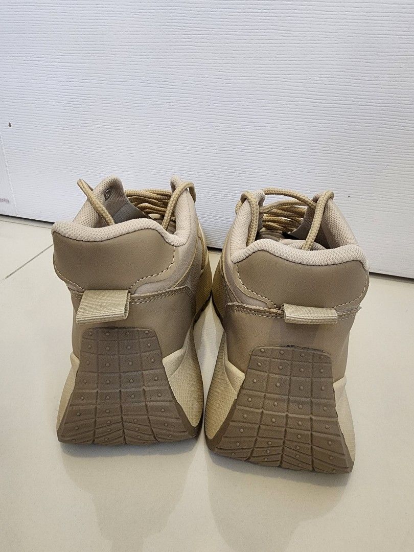 Dupeipu Chunky Platform Sneakers Size 37 (Category: Sneakers) located in Quezon City. Submitted by pinkyshang (Listing ID 1464881584, Image 3). Description: - Brand/Model: Dupeipu Chunky Platform Sneakers - Color: Neutral Beige - Size: 37 (Marked on Outsole) - Design: Lace-up closure with branded tongue label and side tag - Sole: Chunky, textured rubber lug sole - Condition: Clean upper and tread showing minimal to no wear - Brandew. Never been u