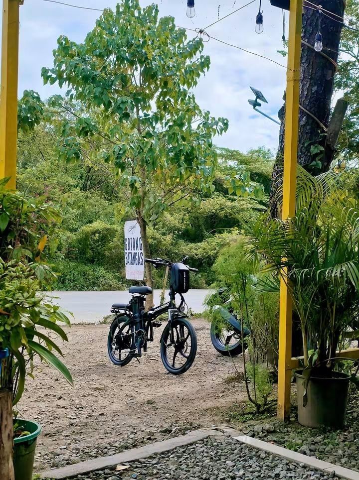 Dynatronz Foldable Electric Bike E-Bike (Category: Bicycles) located in Antipolo. Submitted by pepita21 (Listing ID 1464953316, Image 2). Description: - Brand/Model: Dynatronz Foldable Electric Bike - Color: Sleek Black with matching black alloy wheels - Design: Sturdy frame equipped with dual seats - Storage: Convenient front handlebar-mounted bag included - Portability: Quick folding mechanism for easy storage and commuting - Condition: Ready t