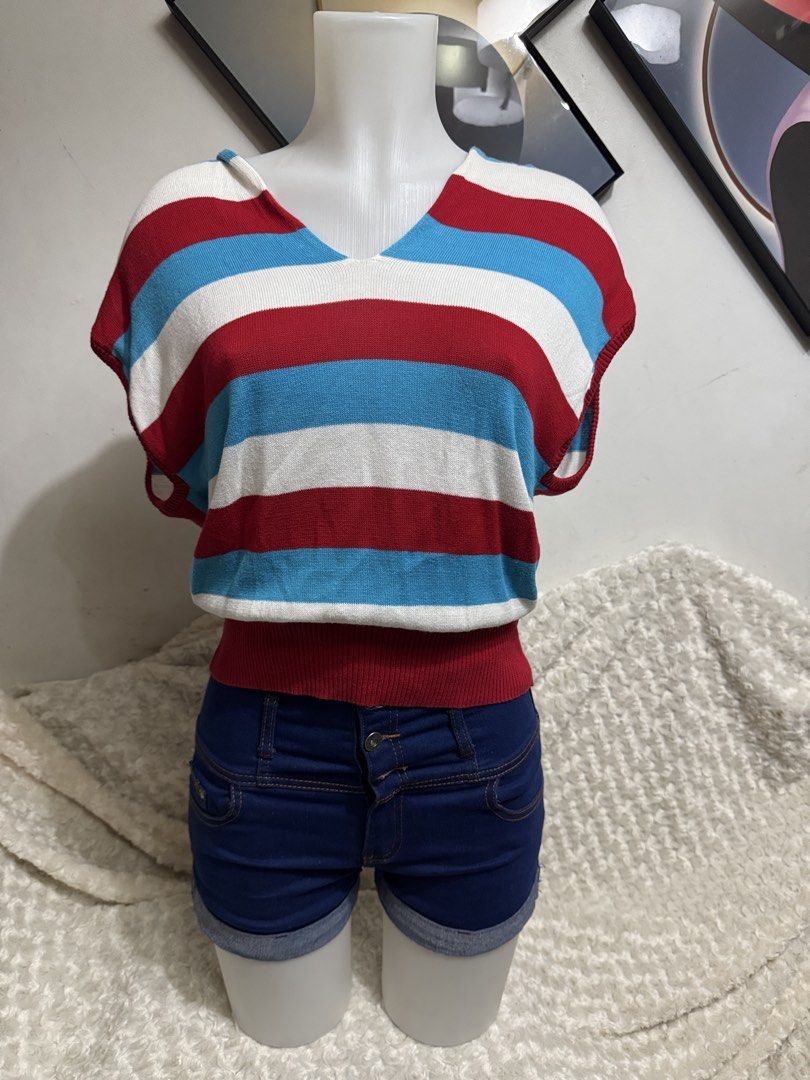 Ebase Striped V-Neck Knit Sweater Size M (Category: Others Tops) located in Marikina City. Submitted by lorradel (Listing ID 1464893648, Image 1). Description: - Brand: Ebase - Size: fits S-M - Color/Pattern: Red, white, and blue retro stripes - Design: V-neck, short cap sleeves, and fitted ribbed hem - Material: Lightweight, soft knit fabric - MAY HAVE some washable stains (hindi maiiwasan) needs washing; had been stored - mannequin size 34-26-3