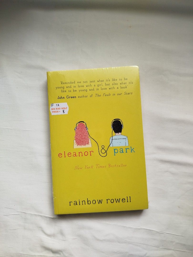 Eleanor & Park by Rainbow Rowell Paperback (Category: Storybooks) located in Dapa. Submitted by yourstrulyhope (Listing ID 1464790327, Image 1). Description: - Title: Popular YA Contemporary Romance Novel by Rainbow Rowell - Edition: Iconic yellow cover with illustrated characters wearing headphones - Accolades: New York Times Bestseller - Condition: Brand new (comes with original Big Bad Wolf bookstore price sticker on the front) - Recommended f