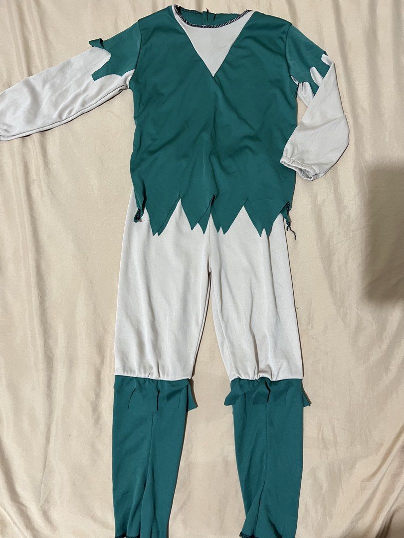Elf Peter Pan Costume Green White Jumpsuit (Category: Babies & Kids Fashion) located in Manila. Submitted by fathie_natural (Listing ID 1464883975, Image 1). Description: 4-5yo - Green and white elf or Peter Pan costume - Includes long-sleeve tunic with jagged hem details on cuffs - Elastic-waist pants with matching green ankle cuffs - Ideal for Halloween, school plays, and costume parties.