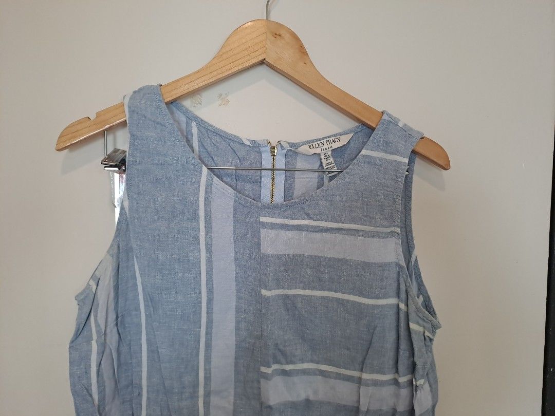 Ellen Tracy 100% Linen (Category: Sleeveless) located in Manila. Submitted by joanbalde39643 (Listing ID 1464826891, Image 2). Description: This is a women's 100% linen sleeveless top by Ellen Tracy, styled with an asymmetric multi-directional blue and white stripe pattern and a back zipper closure..