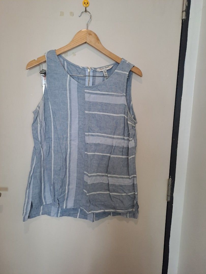 Ellen Tracy 100% Linen (Category: Sleeveless) located in Manila. Submitted by joanbalde39643 (Listing ID 1464826891, Image 1). Description: This is a women's 100% linen sleeveless top by Ellen Tracy, styled with an asymmetric multi-directional blue and white stripe pattern and a back zipper closure..