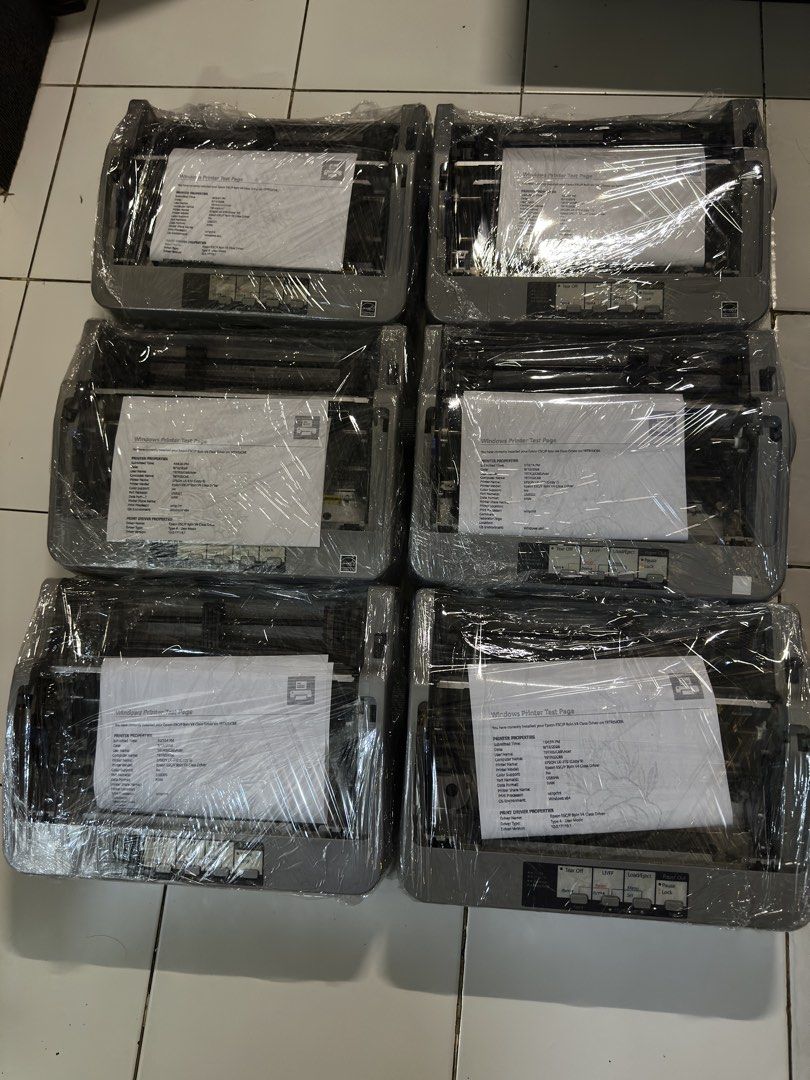 Epson Lx-310 Dot Matrix Printer (Category: Printers, Scanners & Copiers) located in Makati City. Submitted by jtechs (Listing ID 1464937394, Image 1). Description: - Lot of 6 dependable Epson dot matrix printers - Standard grey office design with front-right control panels - Tested and working: Windows printer test pages loaded on each unit - Wrapped in clear plastic for protection - Ideal bulk setup for businesses, offices, or industrial operati