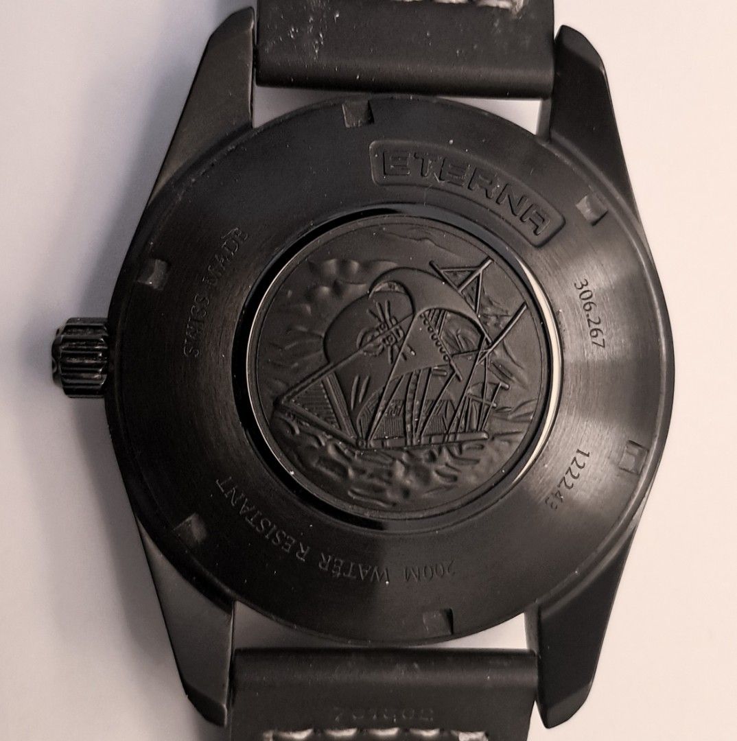 Eterna KonTiki Automatic Black Dial Watch （分類：手錶）位於 Hong Kong。 由 rjdave01 提交（商品編號 1464928413，圖片 3）。簡介： Eterna Adventure KonTiki automatic watch in black. Swiss made, 200m water resistant. Black dial with date window at 4 o'clock. Black leather strap with white stitching and signed buckle. Solid case back featuring the KonTiki raft relief. Original presentation box, outer cardboard box, and warranty card included.。