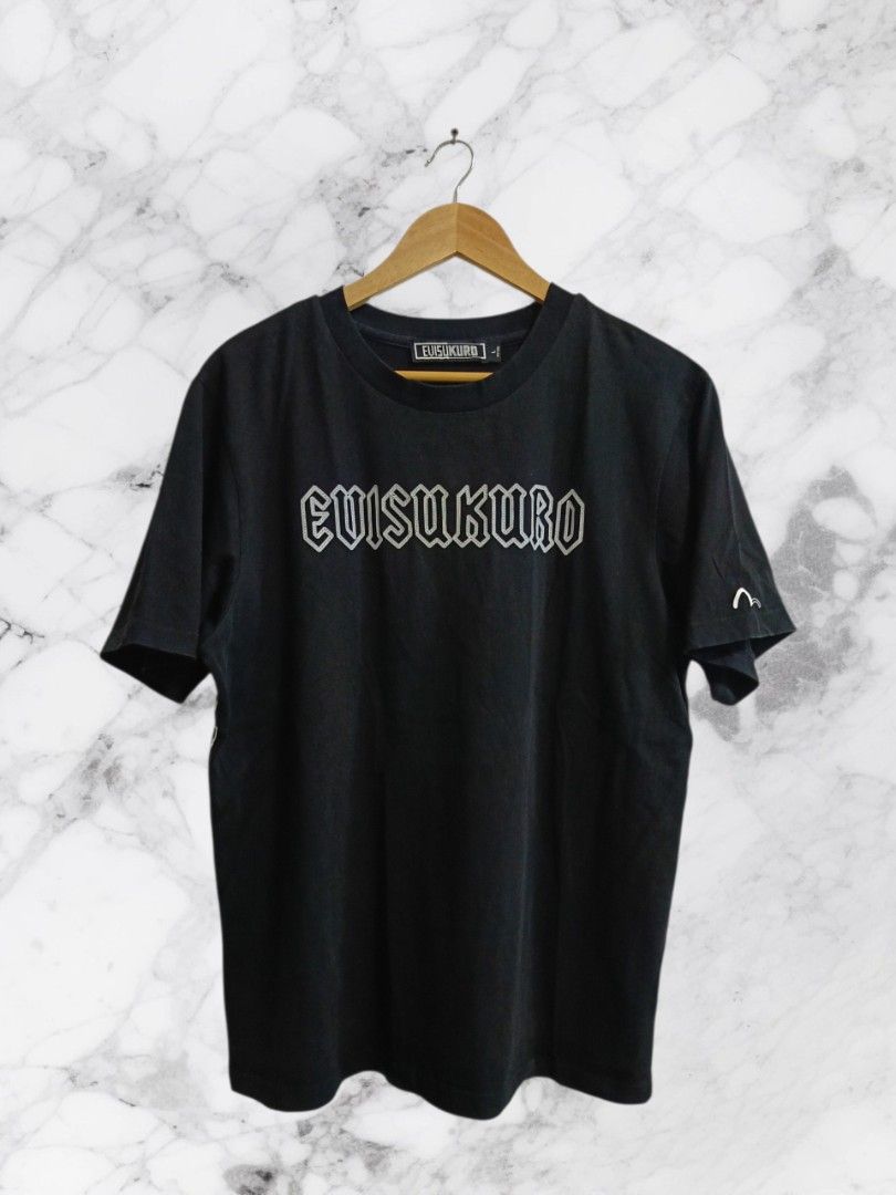 EVISUKURO TEE (Category: Tshirts & Polo Shirts ) located in Kidapawan. Submitted by mabthriftshop (Listing ID 1464910178, Image 2). Description: Condition: EXCELLENT Color rate: 9.8/10 Size: L Dimes: 21x27 Issue: None ⚠️ Buyer Notice: Please review all condition photos and size details carefully before purchasing to ensure a perfect fit. Ship Thru : J&T and LBC.