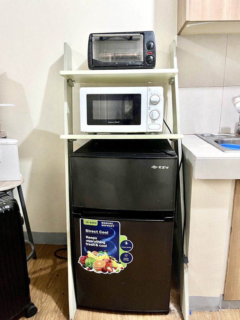 EZY Mini Refrigerator Two Door Direct Cool (Category: Refrigerators and Freezers) located in Manila. Submitted by mrbeatrice35471 (Listing ID 1464795964, Image 1). Description: - Brand/Model: Black EZY two-door mini fridge - Cooling System: Direct cool with manual defrost - Key Features: Energy-saving mode & interior LED light - Condition: Promotional sticker still attached on the bottom door - Size: Compact and space-saving, fits nicely on kitch