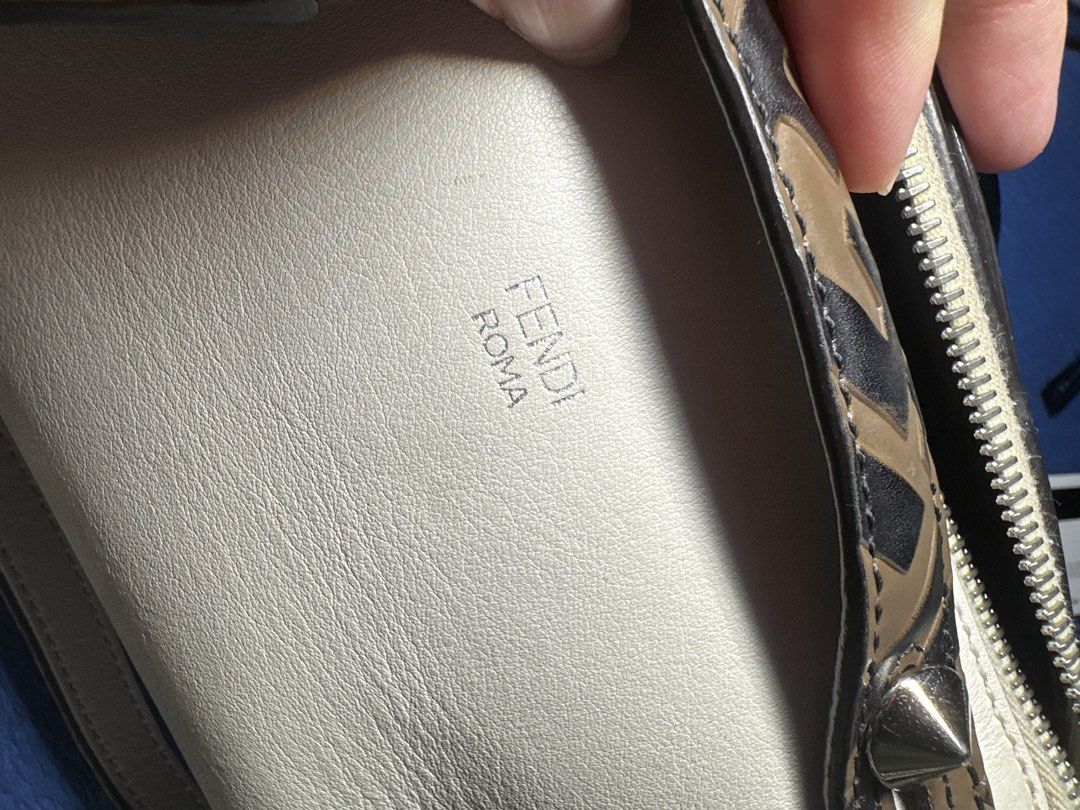 Fendi mini by the way (Category: Luxury Bags & Wallets) located in Antipolo. Submitted by prelovedcloseta (Listing ID 1464775791, Image 3). Description: - Authentic Fendi by the way leather bag - Silver hardware and secure zipper closure - Includes its original adjustable strap for versatile wear - Fabric-lined interior with a convenient small slip pocket and Fendi tag - Clean structure with normal wear; minor scuffing and discoloration on one bo