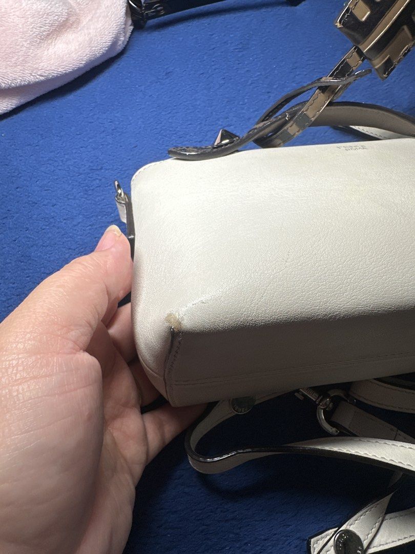 Fendi mini by the way (Category: Luxury Bags & Wallets) located in Antipolo. Submitted by prelovedcloseta (Listing ID 1464775791, Image 1). Description: - Authentic Fendi by the way leather bag - Silver hardware and secure zipper closure - Includes its original adjustable strap for versatile wear - Fabric-lined interior with a convenient small slip pocket and Fendi tag - Clean structure with normal wear; minor scuffing and discoloration on one bo