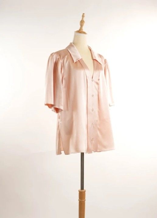 ‼️SALE‼️FENDI SILK V-NECK BLOUSE ( 2019 fall collection) (Category: Luxury Apparel) located in Cabanatuan. Submitted by miss.maia (Listing ID 1464810592, Image 3). Description: Fendi Pale Pink Silk Satin Puff Sleeve Blouse. It is crafted from 100% light salmon-colored silk satin and features a deep V-neck, oversized dropped shoulders, and distinctive pleated puff sleeves. This item originally came out as part of the Fall 2019 collection. Brand-Ne
