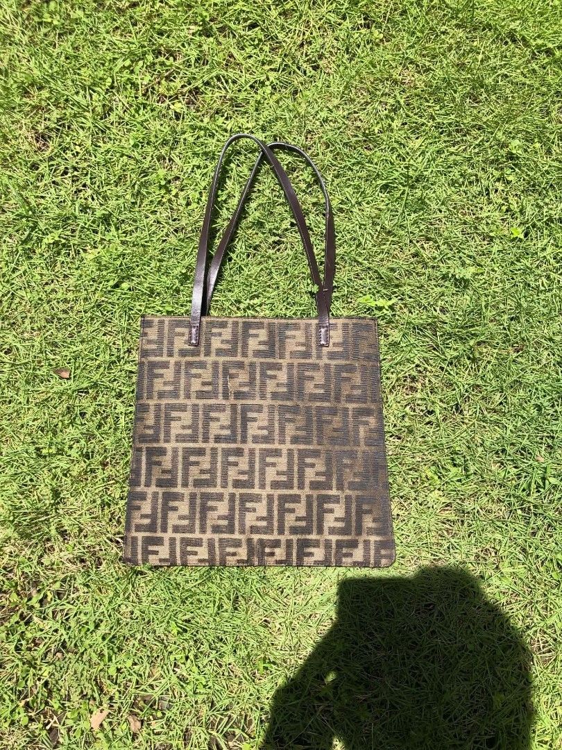 Fendi Zucca (Category: Luxury Bags & Wallets) located in La Union. Submitted by lumang__gamit00 (Listing ID 1464788368, Image 2). Description: Fendi Zucca Canvas Tote Bag featuring the iconic repeating FF monogram pattern and flat leather shoulder.