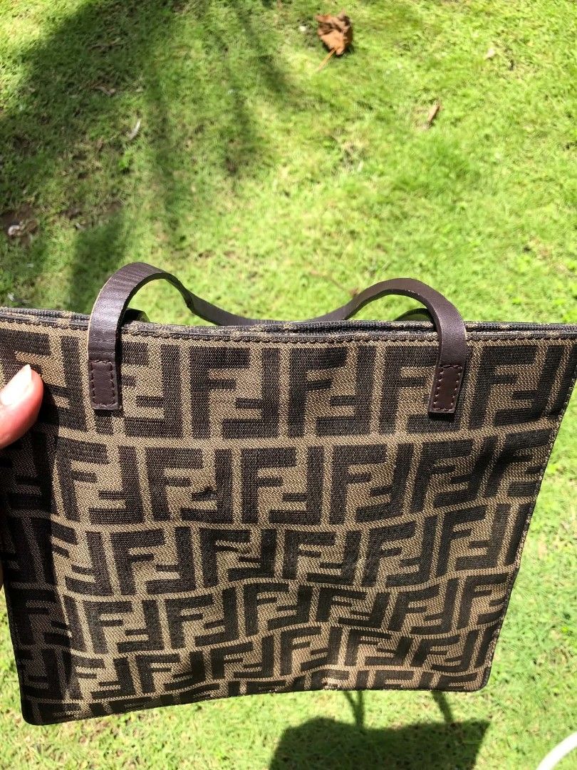 Fendi Zucca (Category: Luxury Bags & Wallets) located in La Union. Submitted by lumang__gamit00 (Listing ID 1464788368, Image 3). Description: Fendi Zucca Canvas Tote Bag featuring the iconic repeating FF monogram pattern and flat leather shoulder.