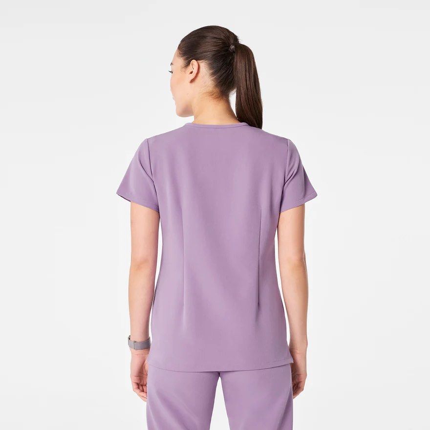 FIGS Casma Scrub Top in Purple Haze (Category: Others Tops) located in Quezon City. Submitted by yssaygg (Listing ID 1464893527, Image 2). Description: FIGS Casma Scrub top in Purple Haze Size Small Only used once, bought in Sept 2026 No flaws PM if interested.