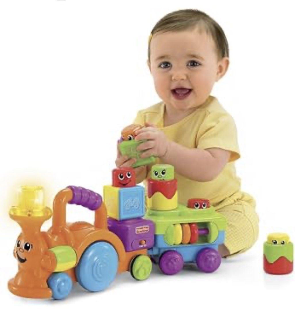 Fisher-Price Laugh & Learn Stacking Train Blocks Set (Category: Educational & Learning Toys) located in Quezon City. Submitted by muffet9 (Listing ID 1464968011, Image 2). Description: - Brand: Fisher-Price - Features: Colorful detachable blocks, sound switches, and lights and music - Design: Orange engine with blue and green carts - Condition: Light and sounds working, fully functional - Perfect for toddler learning and entertainment - bought in
