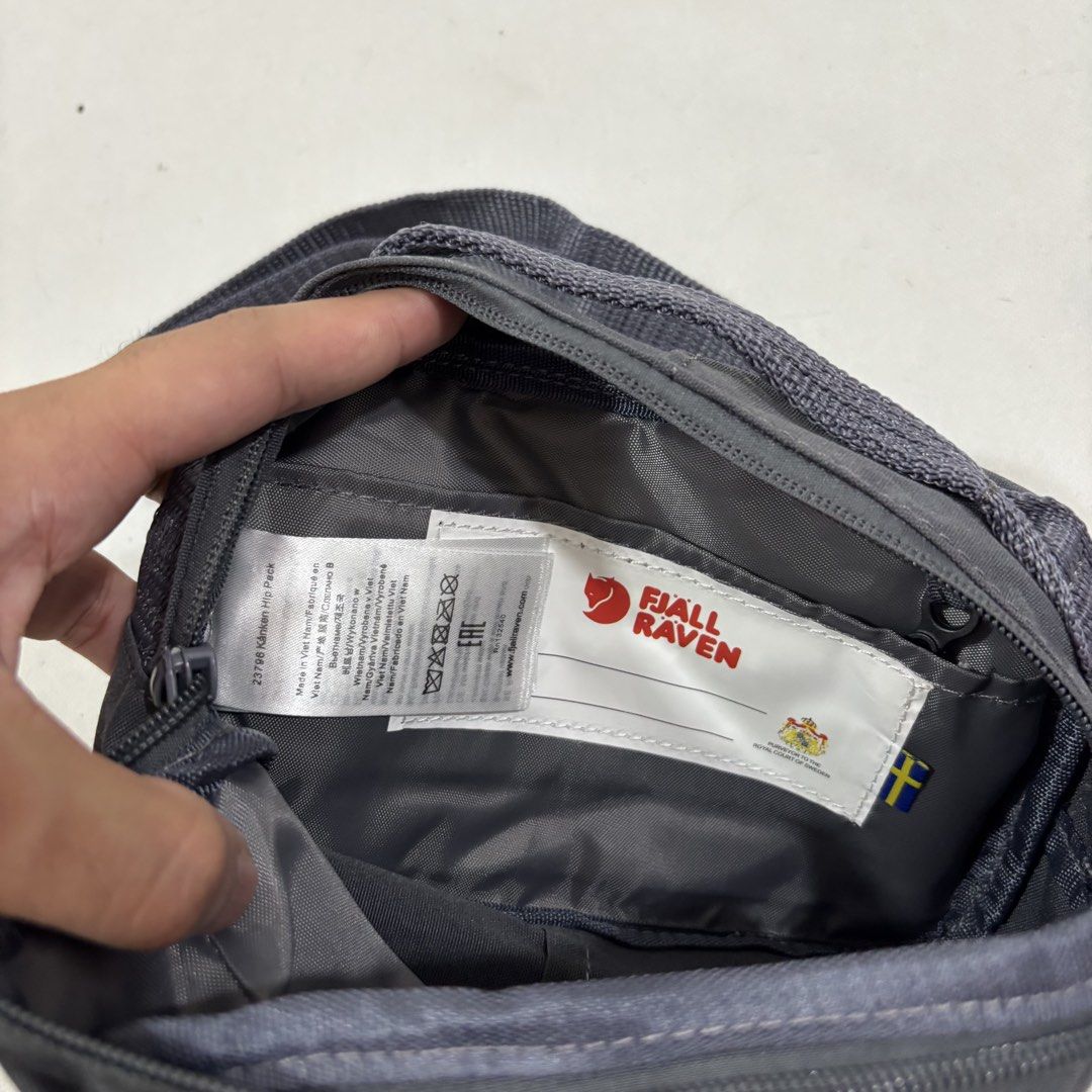 Fjallraven Kanken Hip Pack Dark Grey (Category: Cross-body Bags) located in Cavite. Submitted by itsayaaa (Listing ID 1464836893, Image 3). Description: - dark grey Fjallraven Kanken hip pack (Model 23796) - Crafted from durable, water-resistant Vinylon fabric - Features a secure main zippered compartment and handy front zip pocket - Equipped with an adjustable strap for a comfortable fit - Includes signature interior name label tag and Swedish f