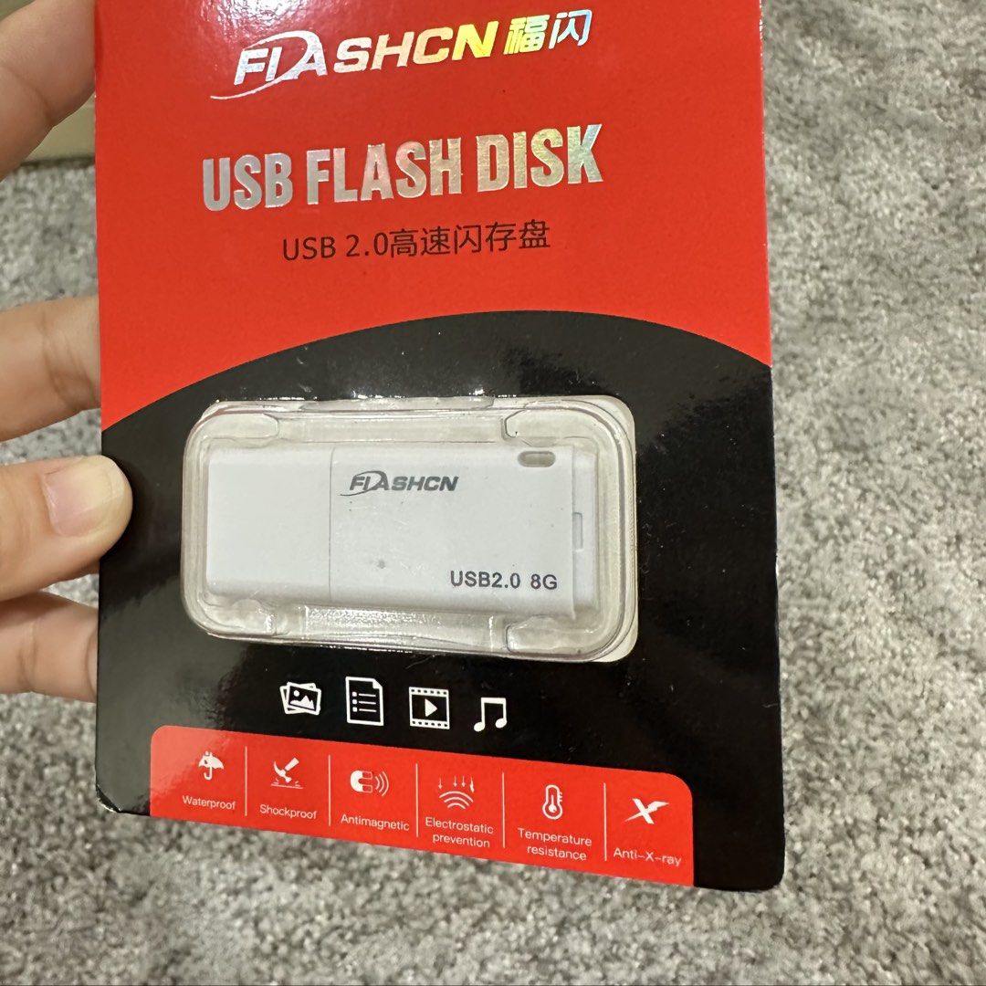 FLASHCN USB 2.0 Flash Disk 8GB White (Category: Hard Disks & Thumbdrives) located in Paranaque City. Submitted by changingclassic (Listing ID 1464802887, Image 2). Description: - Brand: FLASHCN USB 2.0 Flash Drive - Capacity: 8GB portable data storage - Design: Sleek white plastic casing with protective cap - Durability: Water, shock, magnetism, static, and temperature resistant - Compatibility: Works seamlessly with Windows, Mac OS, and Linux - 