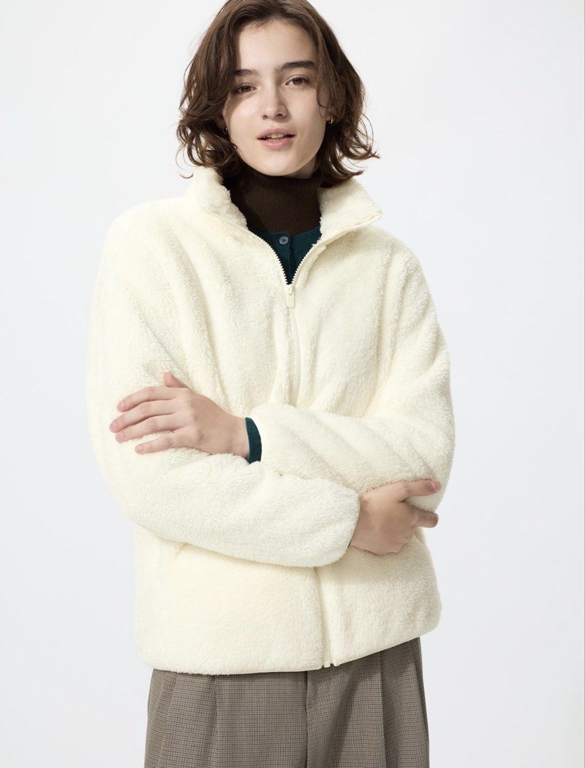 Fluffy Yarn Fleece Full Zip Jacket (Off-White) (Category: Coats, Jackets and Outerwear) located in Rizal. Submitted by jinjeonkook (Listing ID 1464855910, Image 1). Description: - Fluffy cream fleece jacket - High collar with full zip closure - Soft, warm, and perfect for cold weather layering Retails for 1,490 pesos. Shipping fee must be shouldered by the buyer. Never used. Brand new with tag. Rfs: decluttering.
