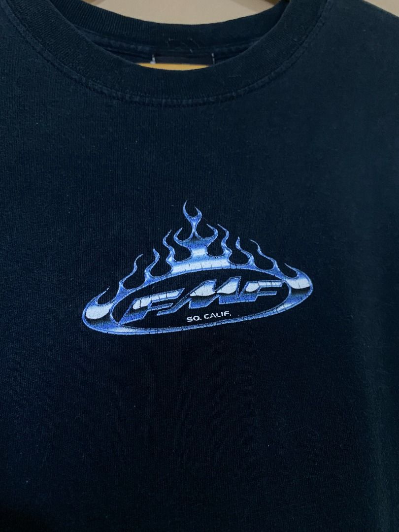 FMF Racing Y2K Chrome Flame Logo (Category: Tshirts & Polo Shirts ) located in Cadiz. Submitted by davidspothead (Listing ID 1464856468, Image 3). Description: Large 21.5 x 29.5 9/10 color rate w/ cracks on print both front and back see more pictures .