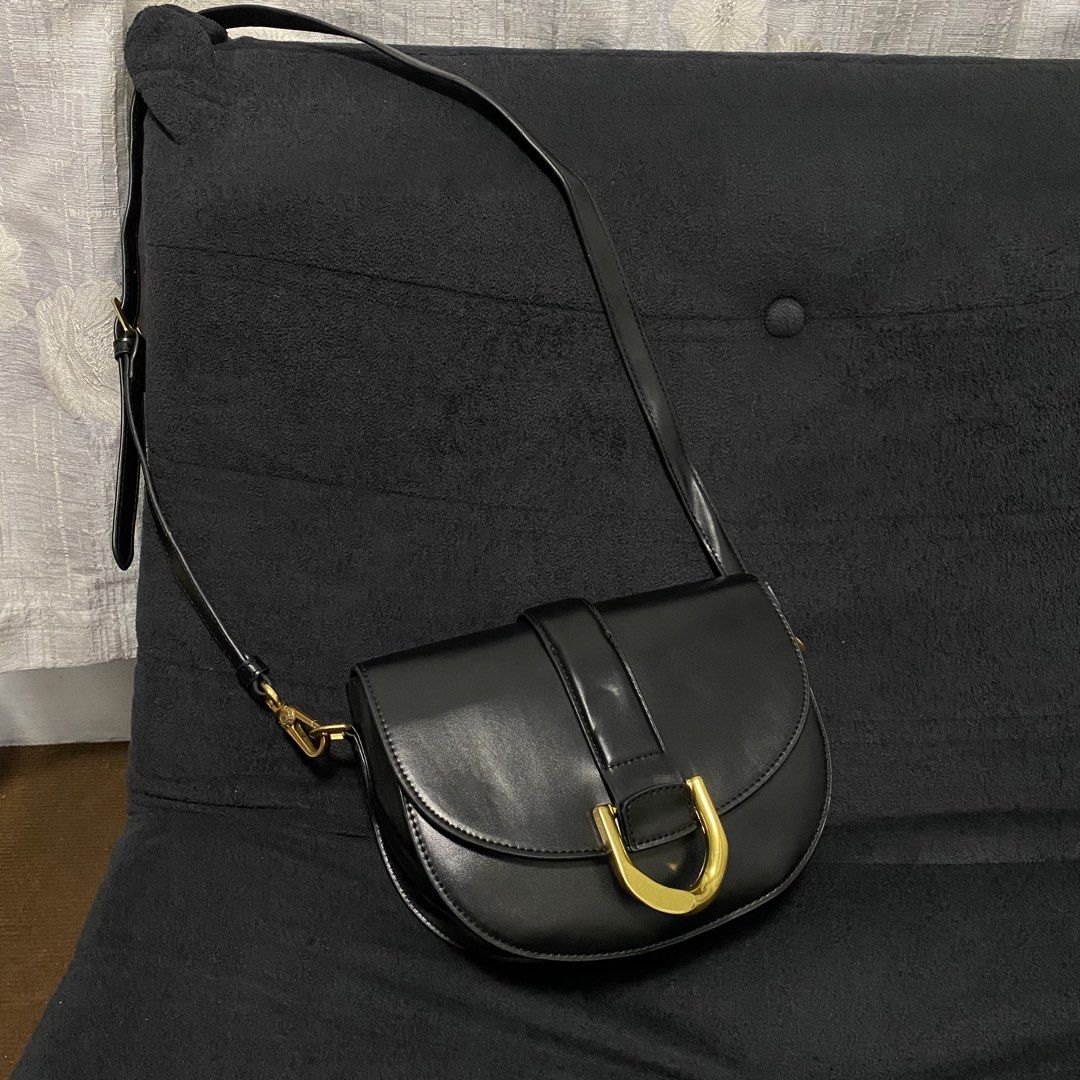For sale (Category: Luxury Bags & Wallets) located in Baliuag. Submitted by thriftpuff (Listing ID 1464965333, Image 1). Description: Charles & Keith Gabine Leather Saddle Bag Rank A No issue Price: 2,000 free shipping Direct message if you’re interested 📩📩📩.