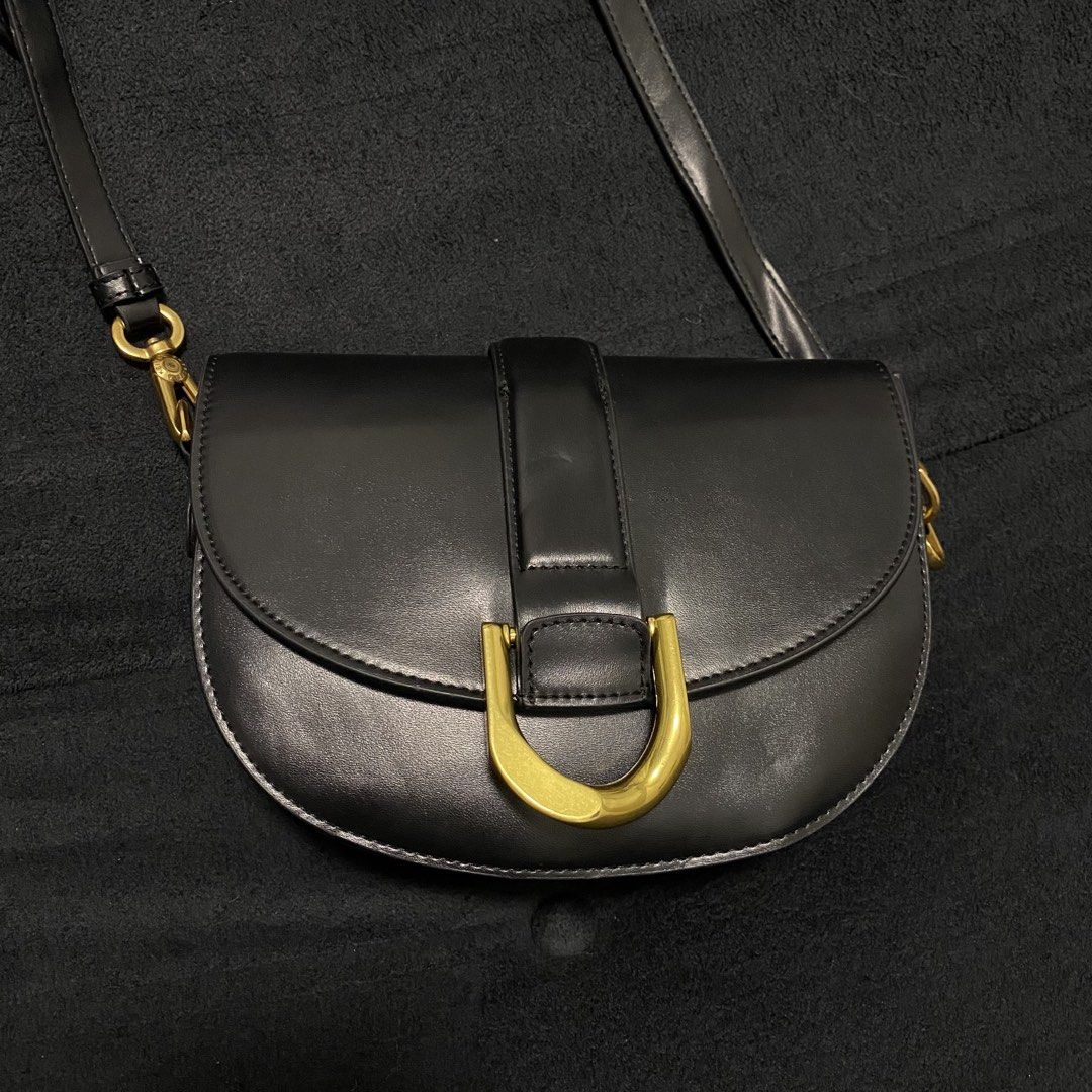 For sale (Category: Luxury Bags & Wallets) located in Baliuag. Submitted by thriftpuff (Listing ID 1464965333, Image 3). Description: Charles & Keith Gabine Leather Saddle Bag Rank A No issue Price: 2,000 free shipping Direct message if you’re interested 📩📩📩.