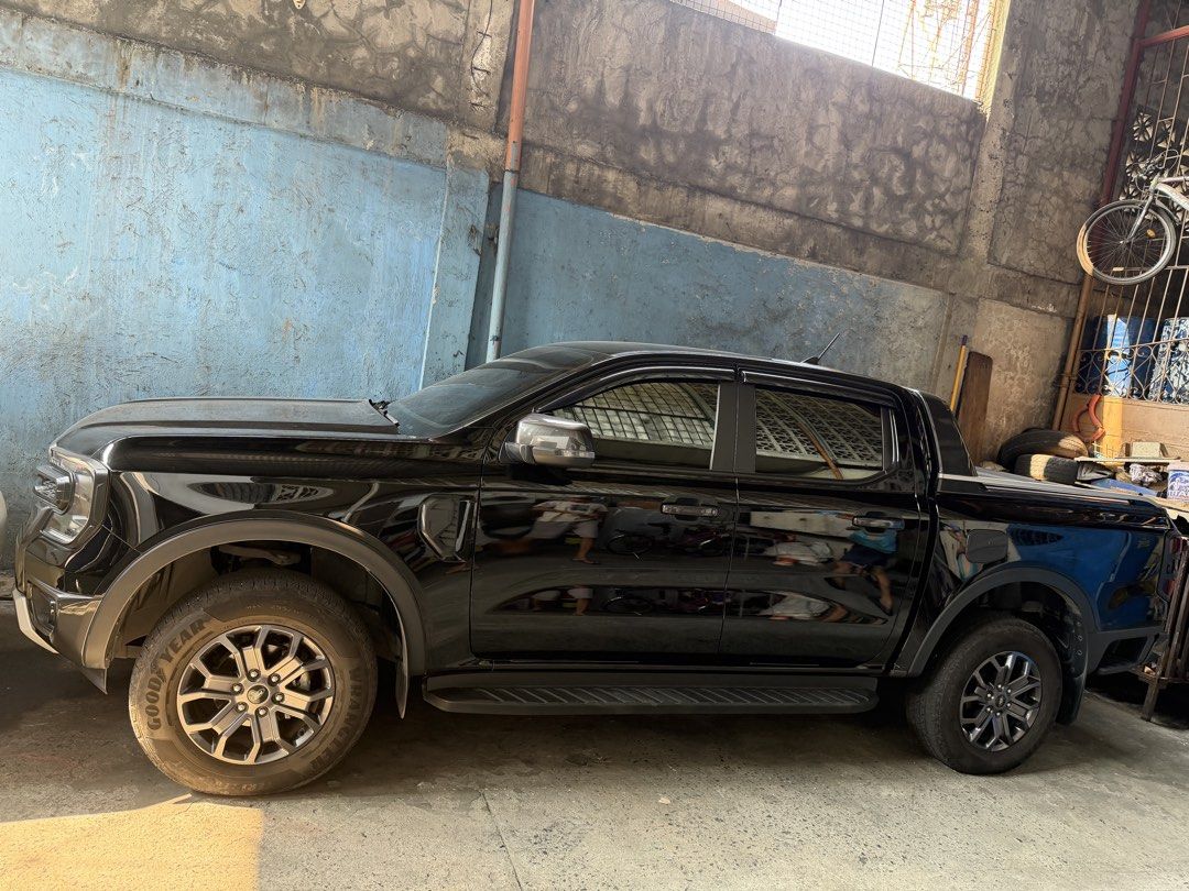 Ford Ranger (Category: Used Cars) located in Quezon City. Submitted by wiltsai_160 (Listing ID 1464788046, Image 3). Description: Ford ranger sports xlt matic 4x2 blk fresh rush 09619199236.