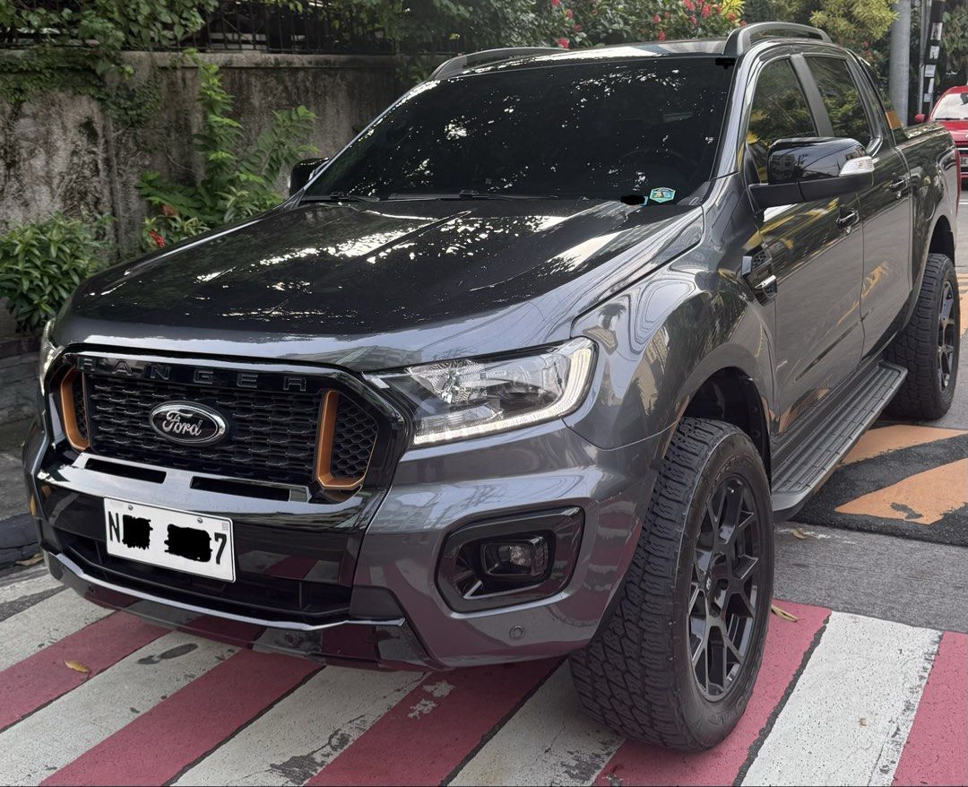 Ford Ranger Wildtrak 2022 Auto (Category: Used Cars) located in Pasig City. Submitted by gregory777 (Listing ID 1464859220, Image 2). Description: Ford Ranger Wildtrack 4x2 Automatic 100% flood free 26k mileage legit odo Black Rhino rims included First owner See to appreciate Casa maintained .