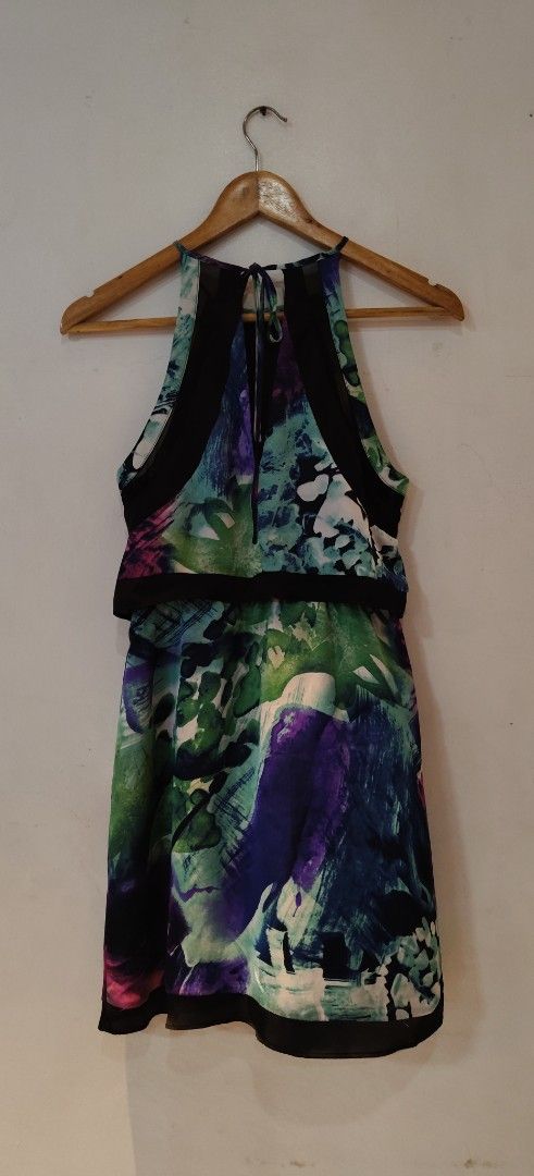 Forever 21 Abstract Print Halter Dress (Category: Dresses) located in Urdaneta. Submitted by nessylaugi (Listing ID 1464825634, Image 3). Description: - Brand: Forever 21 - Style: Halter dress with layered design and black contrast trim - Print/Colors: Abstract print in blue, green, and purple - Size: XS (fits true to size) - Condition: Worn once for a quick photo, practically brand new Xs on tag but can fit up to Medium frame ladies used once on