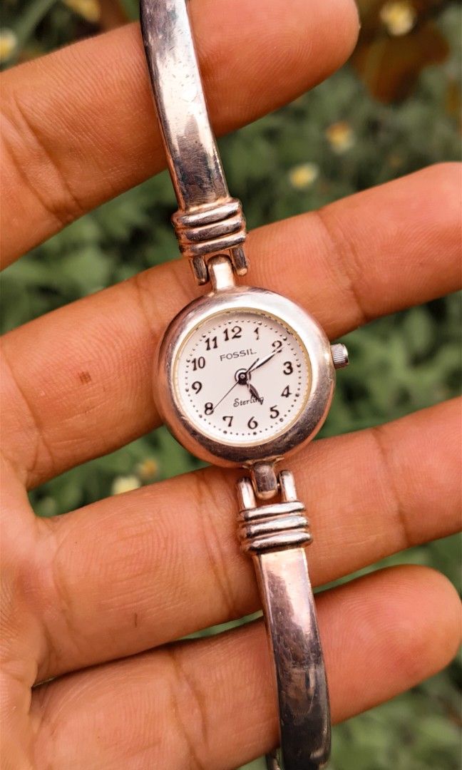 Fossil sterling silver watch (Category: Women's Watches) located in Manila. Submitted by julius_onlineshop14 (Listing ID 1464887764, Image 3). Description: preloved sterling silver watch fit up to 7" to 7.5 for ladies keeps time accurate solid case and bracelet silver.