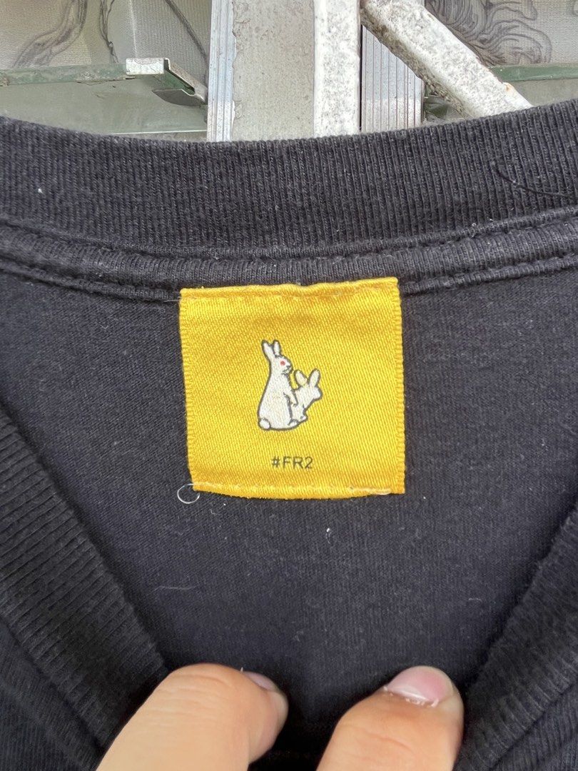 #FR2 Black T-Shirt with Bunny Graphic (Category: Shirts) located in Pilar. Submitted by fast-flip-ni-miko. (Listing ID 1464806826, Image 1). Description: - Brand: #FR2 - Color: Black with iconic large bunny graphic on the back - Size: M (Regular crew neck cut) - Material: 100% cotton, made in Honduras - Details: Features a yellow collar tag and Japanese text care label near the hem - Condition: Excellent, message for more details or fast checkout