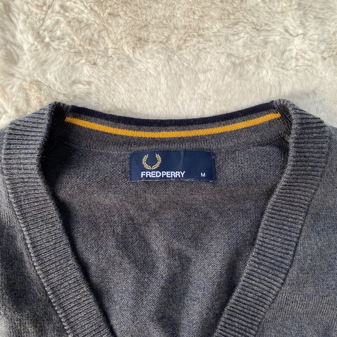 FRED PERRY - KNITTED CARDIGAN AUTHENTIC (Category: Activewear) located in Bacolod City. Submitted by mic_moneyyyyy (Listing ID 1458611634, Image 3). Description: FRED PERRY - KNITTED CARDIGAN Size : Tagged as Medium Width : 19-21 Length : 27 Sleeve : 27 Condition : Excellent No issue need wash .