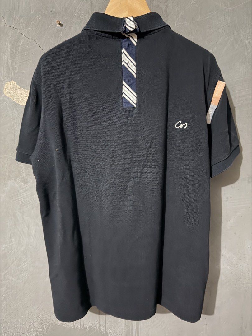 Fred Perry x Carl Jan Cruz (Category: Tshirts & Polo Shirts ) located in Makati City. Submitted by homme.boy.plus (Listing ID 1464691370, Image 2). Description: Fred Perry x Carl Jan Cruz Navy Blue Medium 20 x 24 cotton piqué Special chest embroidery and striped fabric accent on the back collar Limited Excellent, well-maintained.
