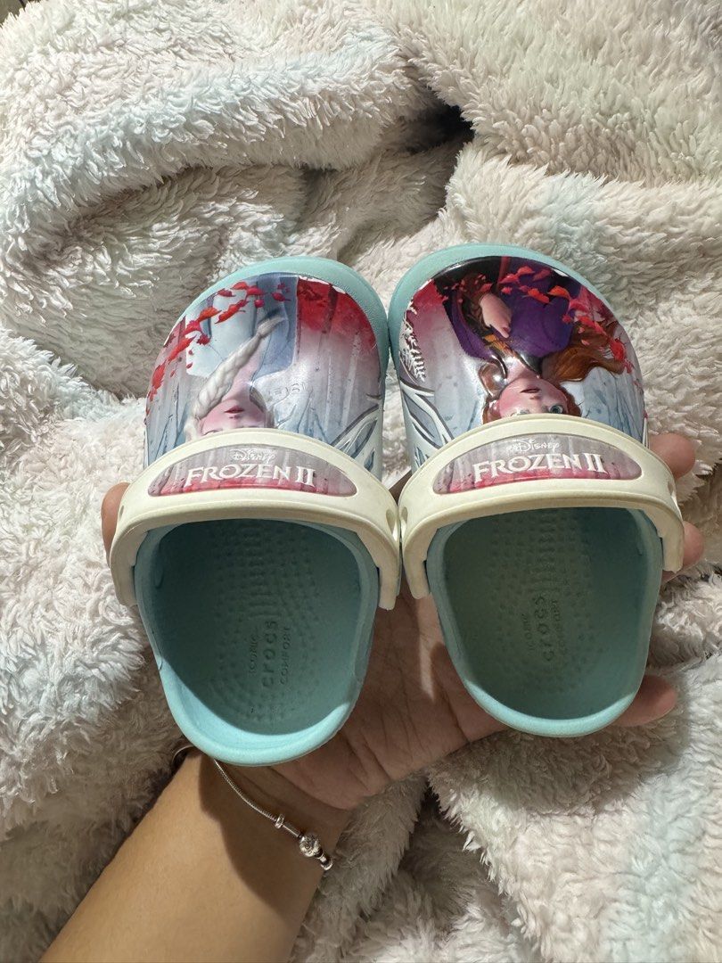 Frozen Crocs Kids (Category: Babies & Kids Fashion) located in Manila. Submitted by nicoleaure20 (Listing ID 1464934524, Image 1). Description: well used but still in good condition :) - location: sampaloc, manila - mop: gcash/bpi - can be shipped thru lalamove/grab/ toktok/j&t but the buyer should shoulder the fee :) .