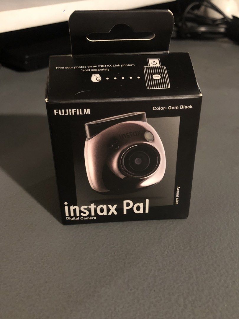 Fujifilm Instax Pal Digital Camera Gem Black (Category: Cameras) located in Quezon City. Submitted by epvb__ (Listing ID 1464888911, Image 1). Description: - Model: Fujifilm Instax Pal Digital Camera - Color: Gem Black - Condition: Mint condition - Features: Pocket-sized, connects to smartphone via Instax Pal app - Inclusions: Multi-use detachable ring, type-c charging cable, and original box - Perfect for everyday fun and easy portability.
