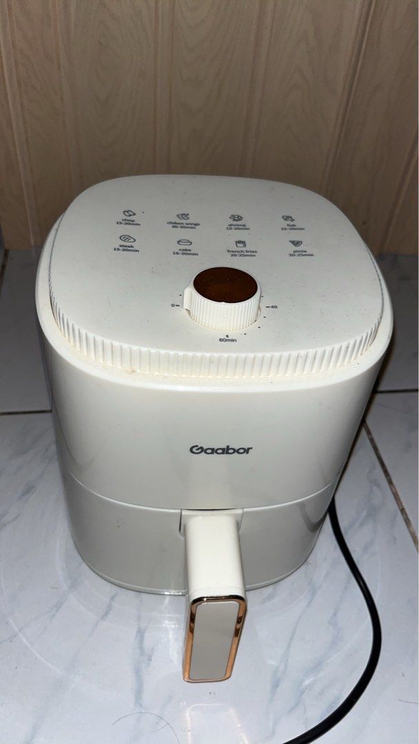 Gaabor Air Fryer White (Category: Bathroom & Kitchen Fixtures) located in Marikina City. Submitted by yokorobiii (Listing ID 1464947770, Image 1). Description: Brand: Gaabor Product Name: Air Fryer Model: AF-35M02A/AF-35M01A Rated Capacity: 4L Color: Black/White Product Size: 218*310*273 (mm) Location: Marikina.