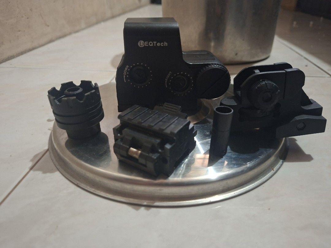 Gel blaster accessories (Category: Action & Battle Toys) located in Manila. Submitted by balangjhon51268 (Listing ID 1464840967, Image 1). Description: *BUNDLE - 300 pesos TAKE ALL:* - M4 rear sight - Dummy EOTech replica (no battery / display only) - ARP9 muzzle (toy) - Hop-up unit.