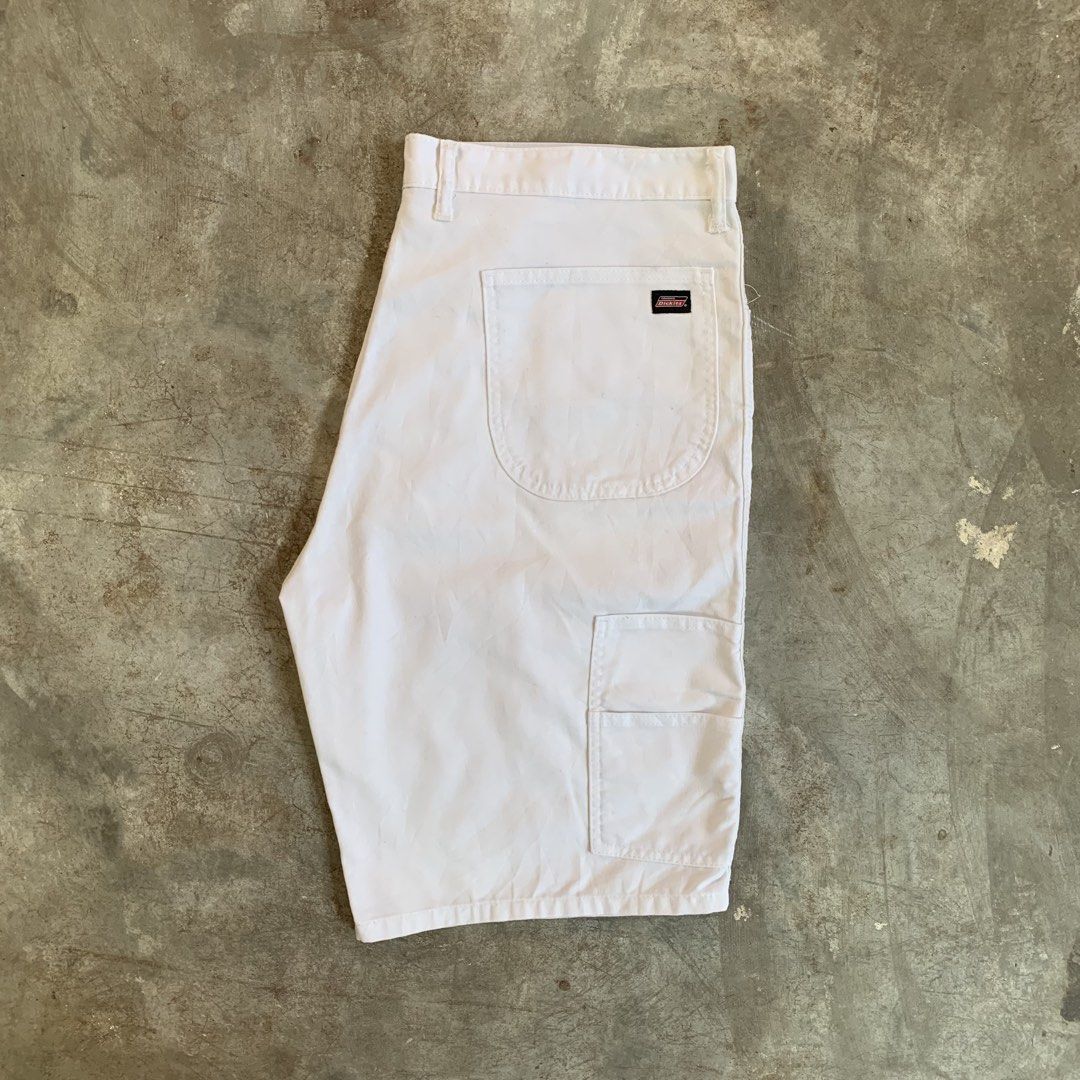 Genuine Dickies White Carpenter Shorts (Category: Shorts) located in Manila. Submitted by emplysthrift. (Listing ID 1464896562, Image 3). Description: Actual dimes on tapemeasure Waist "41 Length "23 Excellent Condition Colorrate: 9.5/10 Flaws: cutwash (authentic) Unli vouch/vc for safe transactions 📲 Location: Laspinas City, Metro Manila, Brngy Talon Uno. 📍 DM IF INTERESTED📥 - Authentic white Dickies carpenter shorts - Classic utility style w