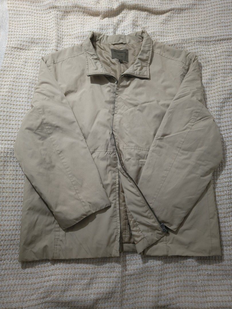 Gio Jeans Co Beige Casual Jacket (Category: Coats, Jackets and Outerwear) located in Paranaque City. Submitted by vicibaltazar (Listing ID 1464811221, Image 1). Description: - Brand: Gio Jeans Co - Color: Khaki Beige - Closure: Full front zip with high collar - Sleeves: Long with adjustable velcro cuffs - Style: Clean lines and classic cut - Condition: good .
