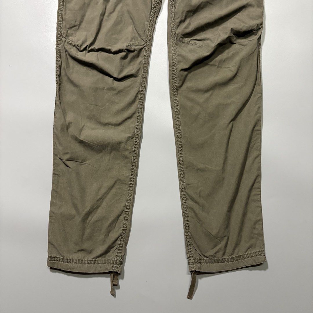 G.O.A 2000s Military Cargo Pants (Category: Other Bottoms) located in Quezon City. Submitted by tayabaskartell (Listing ID 1464904948, Image 3). Description: G.O.A 2000s Military Cargo Pants 2000s Japanese archive cargo pants with rib waist and leather trim by G.O.A. Originating from the defunct Japanese label G.O.A produced under WAVE International, these trousers exemplify the mid-2000s Japanese military and grunge revival. The brand gained a s